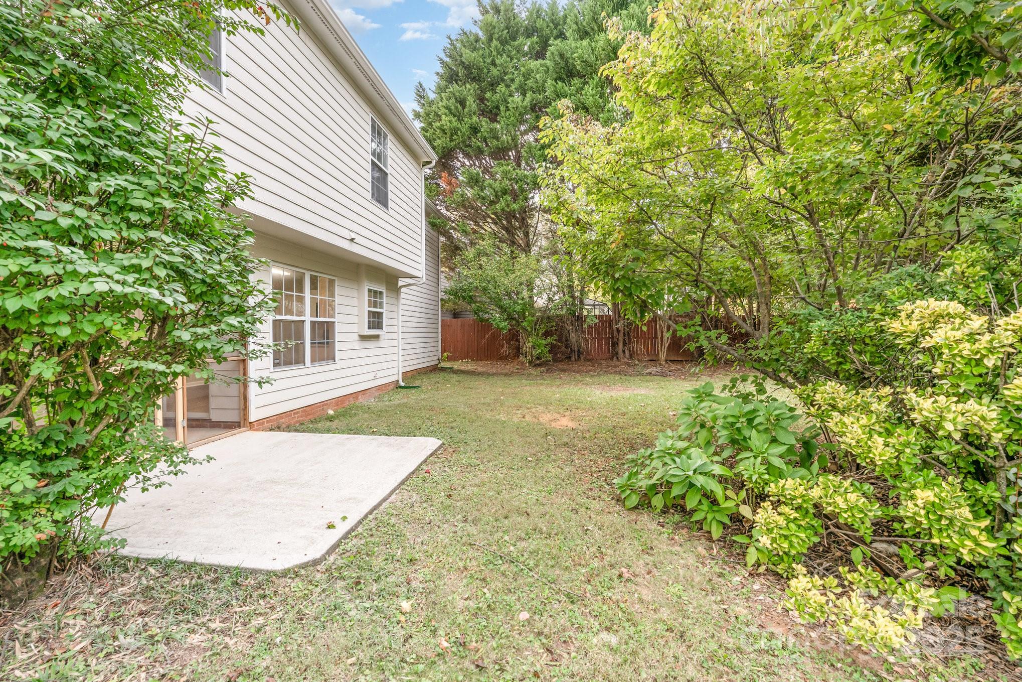 7527 Henderson Park Road Huntersville, NC 28078 - Photo 18 of 18 a view of backyard of house with green space