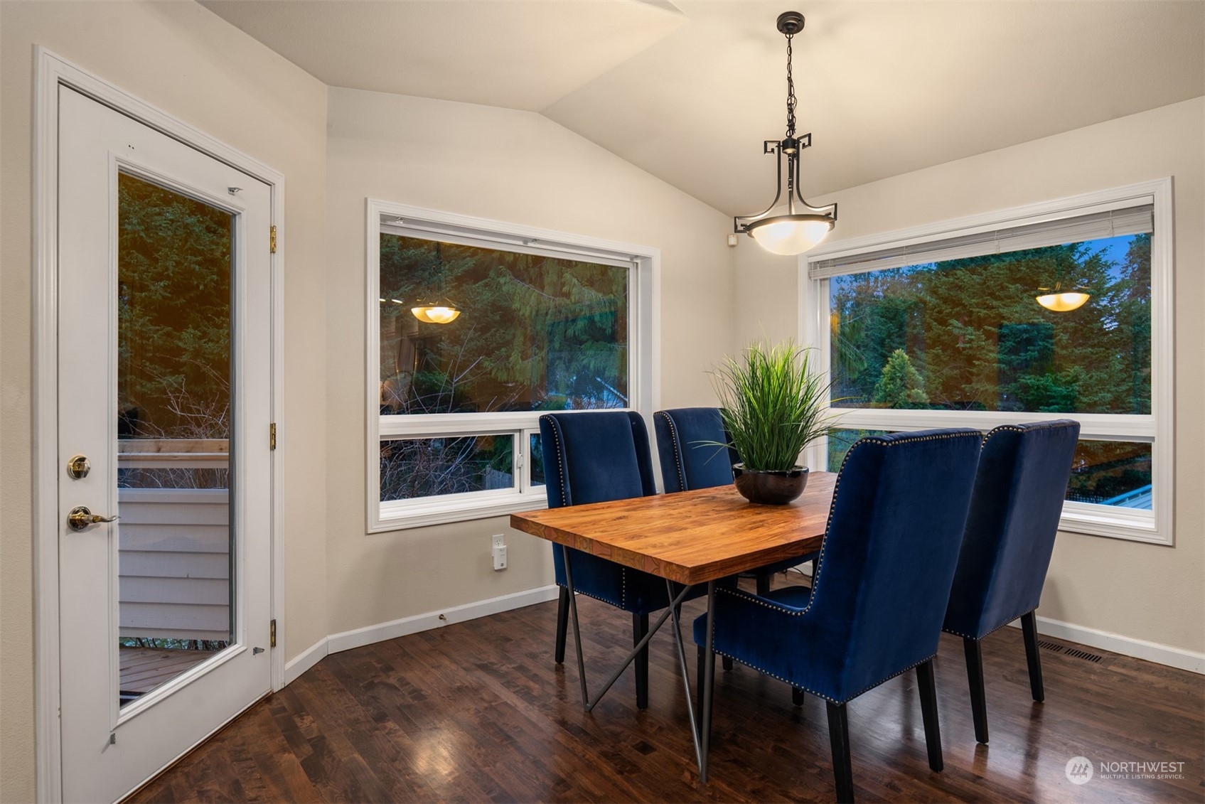 16034 68th Avenue West Edmonds, WA 98026 - Photo 12 of 32 a view of a dining room with furniture window and wooden floor