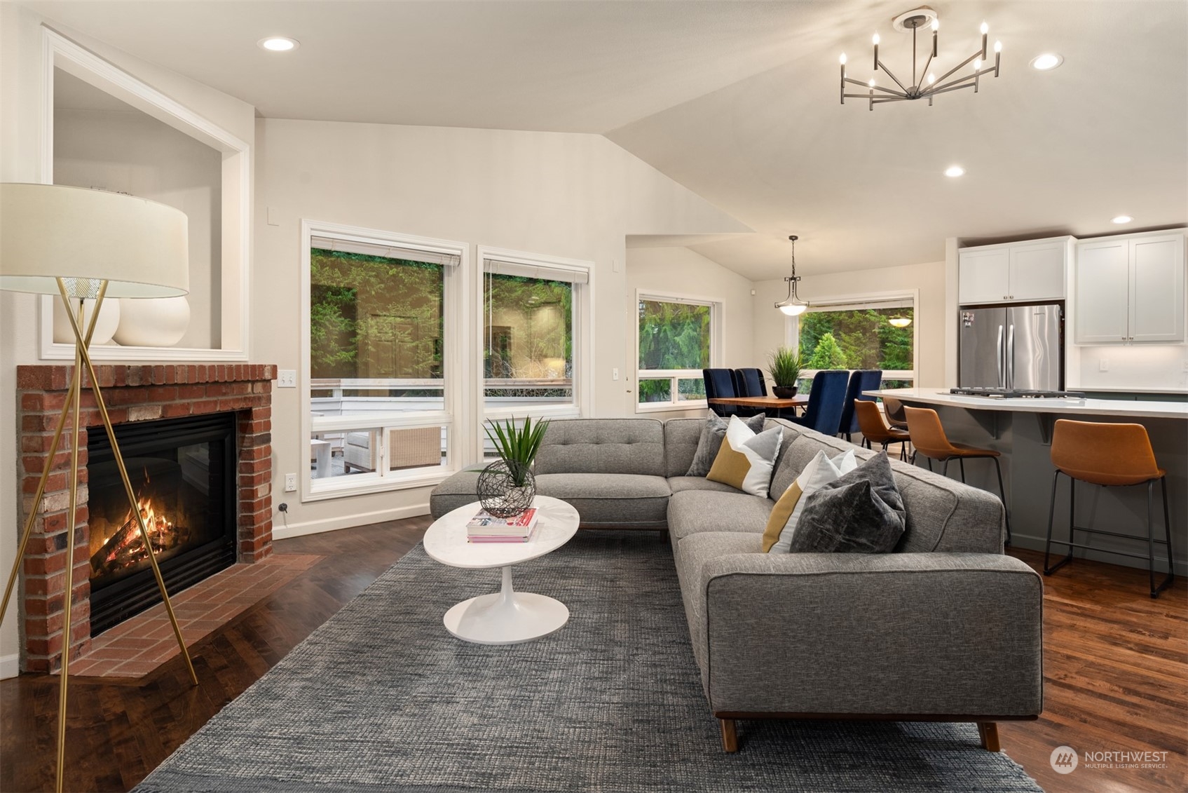 16034 68th Avenue West Edmonds, WA 98026 - Photo 13 of 32 a living room with furniture and a fireplace