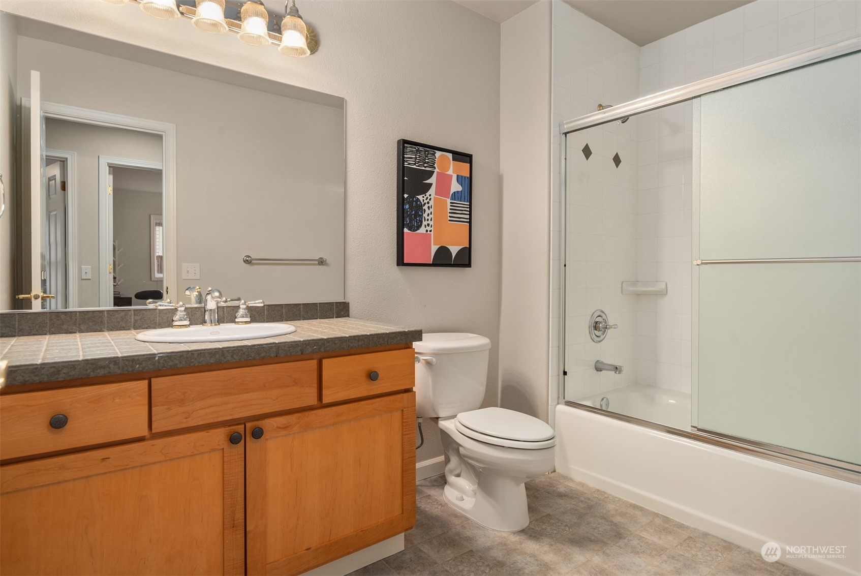 16034 68th Avenue West Edmonds, WA 98026 - Photo 22 of 32 a bathroom with a sink a toilet and shower