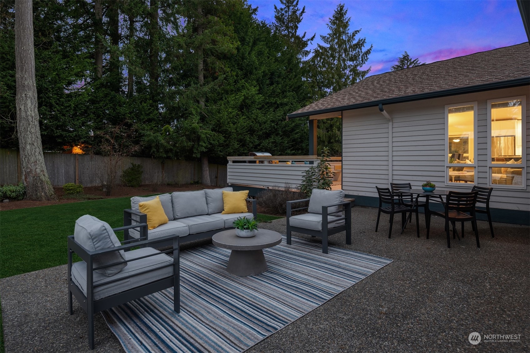 16034 68th Avenue West Edmonds, WA 98026 - Photo 26 of 32 a view of a patio with couches chairs and a fire pit