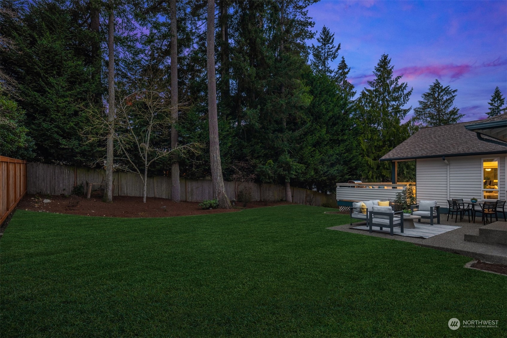 16034 68th Avenue West Edmonds, WA 98026 - Photo 28 of 32 a view of a chair and table in backyard of the house