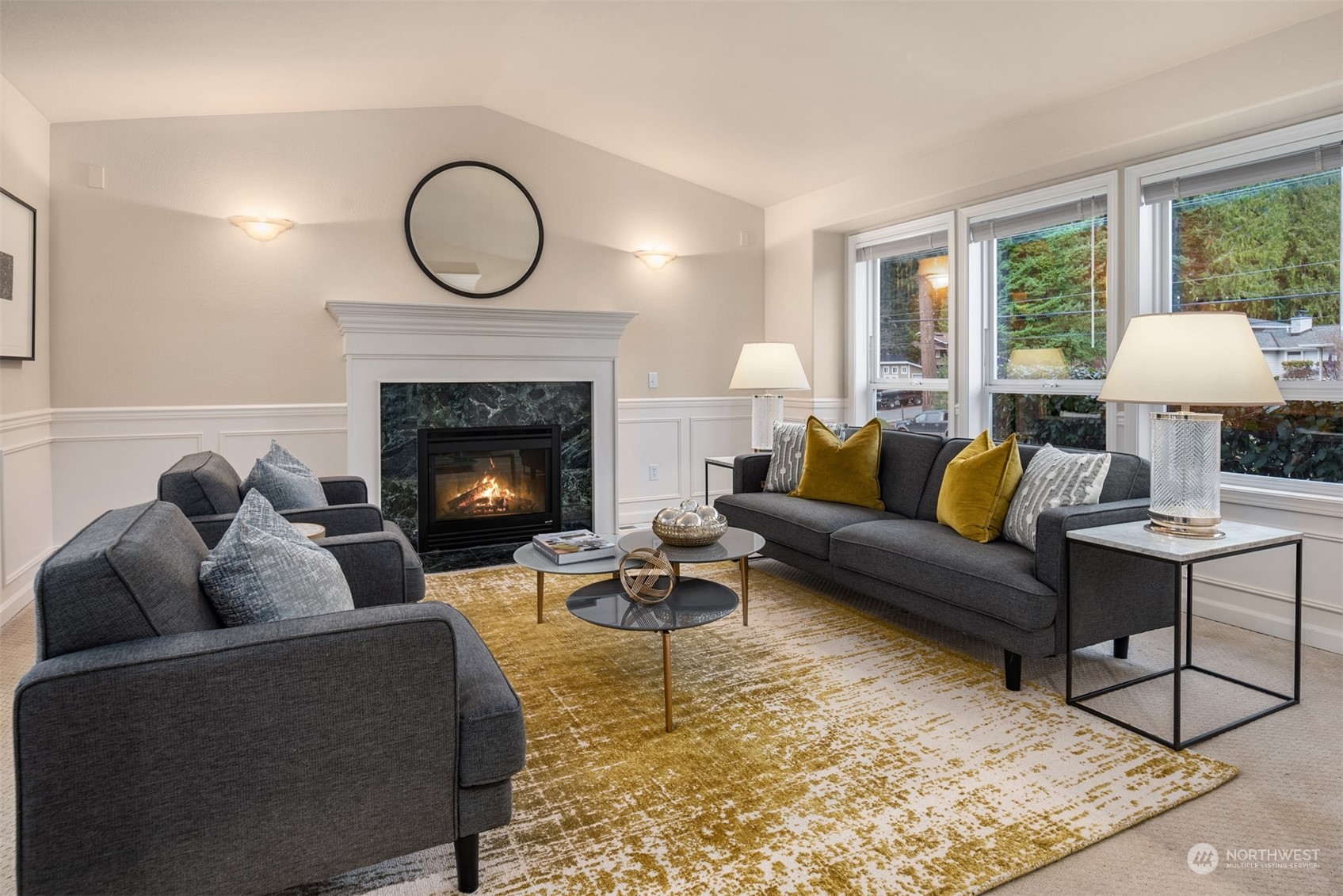 16034 68th Avenue West Edmonds, WA 98026 - Photo 4 of 32 a living room with furniture and a fireplace