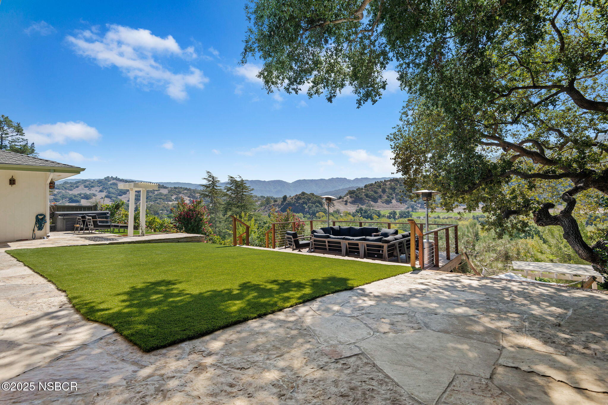 137 3rd Street Solvang, CA 93463 - Photo 25 of 48 a view of a swimming pool with a yard