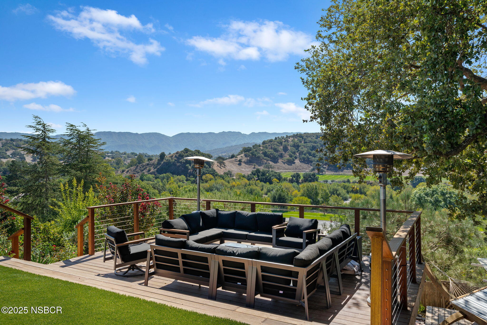 137 3rd Street Solvang, CA 93463 - Photo 31 of 48 a view of a chairs and table in the terrace