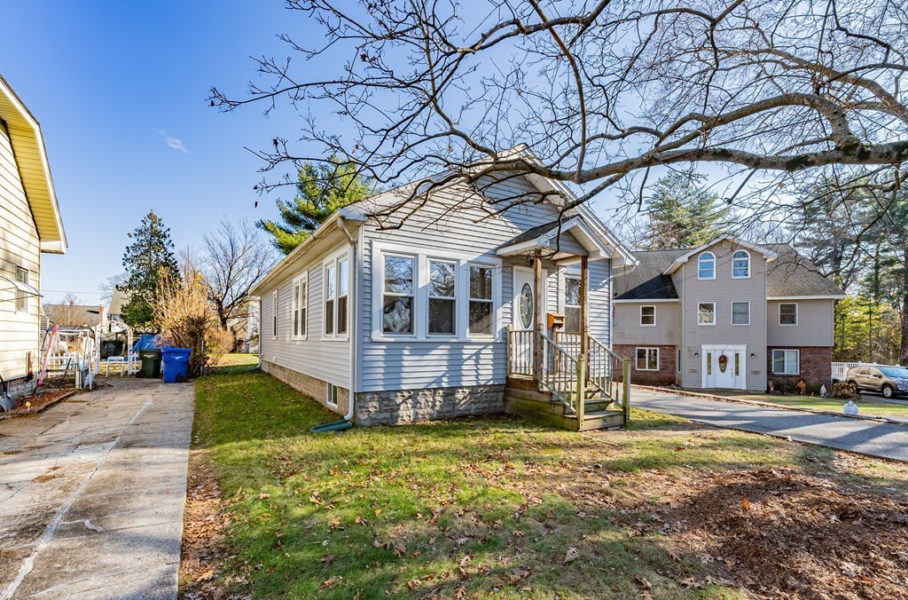 127 Webber Street Springfield, MA 01108 - Photo 1 of 33 a house view with a sitting space and garden