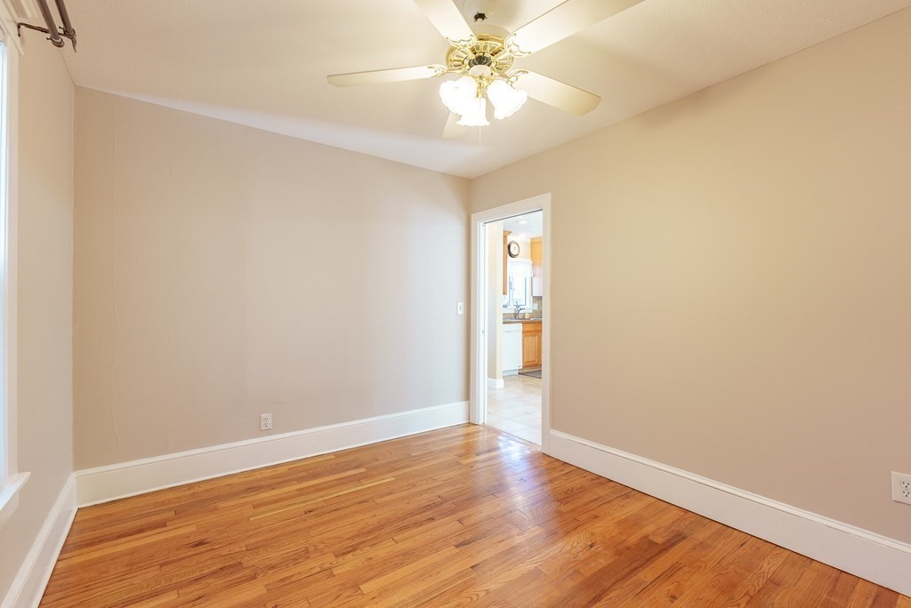 127 Webber Street Springfield, MA 01108 - Photo 21 of 33 a view of an empty room with wooden floor