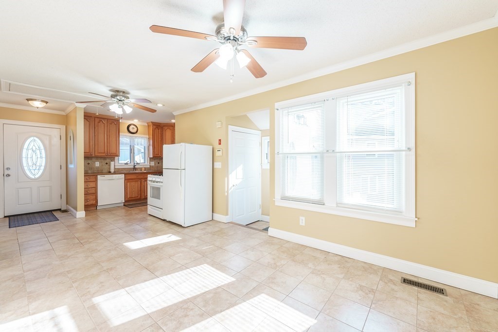 127 Webber Street Springfield, MA 01108 - Photo 3 of 33 a view of a kitchen with cabinet and a ceiling fan