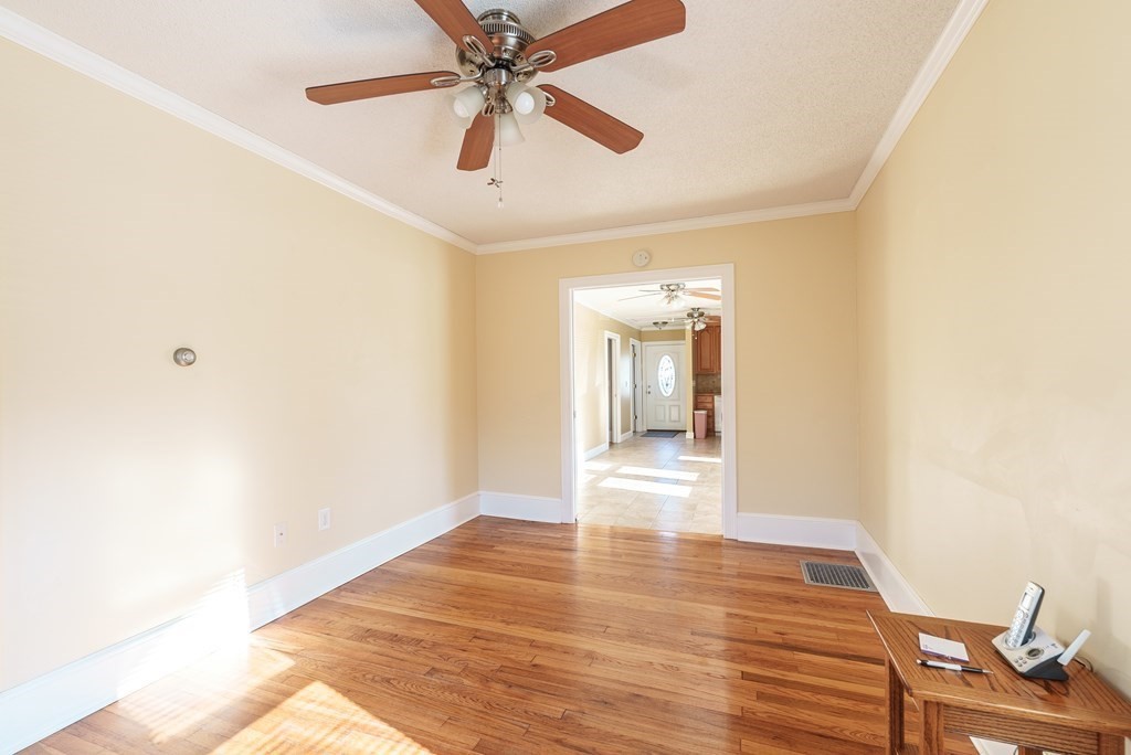 127 Webber Street Springfield, MA 01108 - Photo 9 of 33 a view of empty room with wooden floor