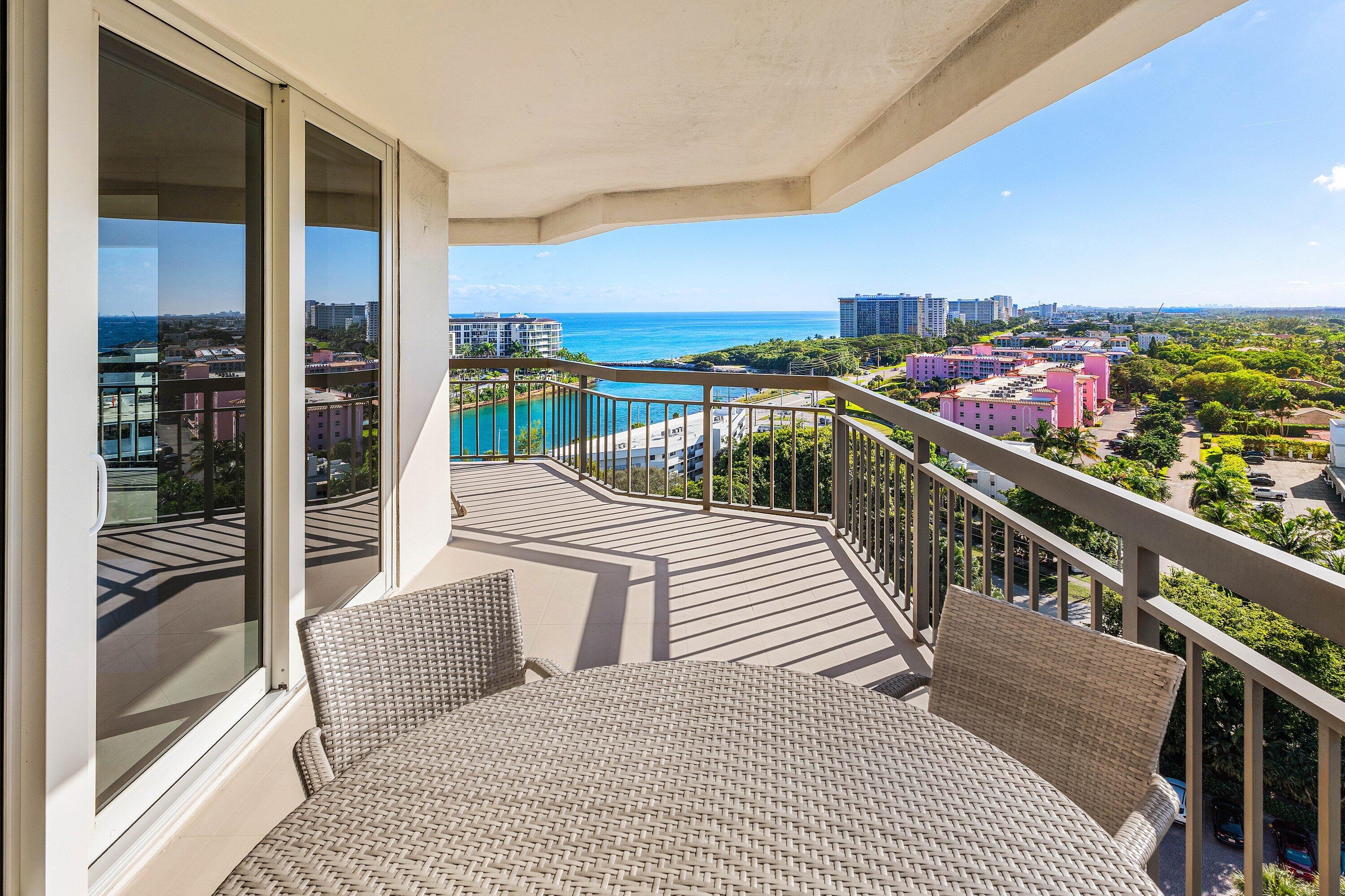 901 East Camino Real, Unit 15D Boca Raton, FL 33432 - Photo 22 of 42 a balcony with furniture and city view
