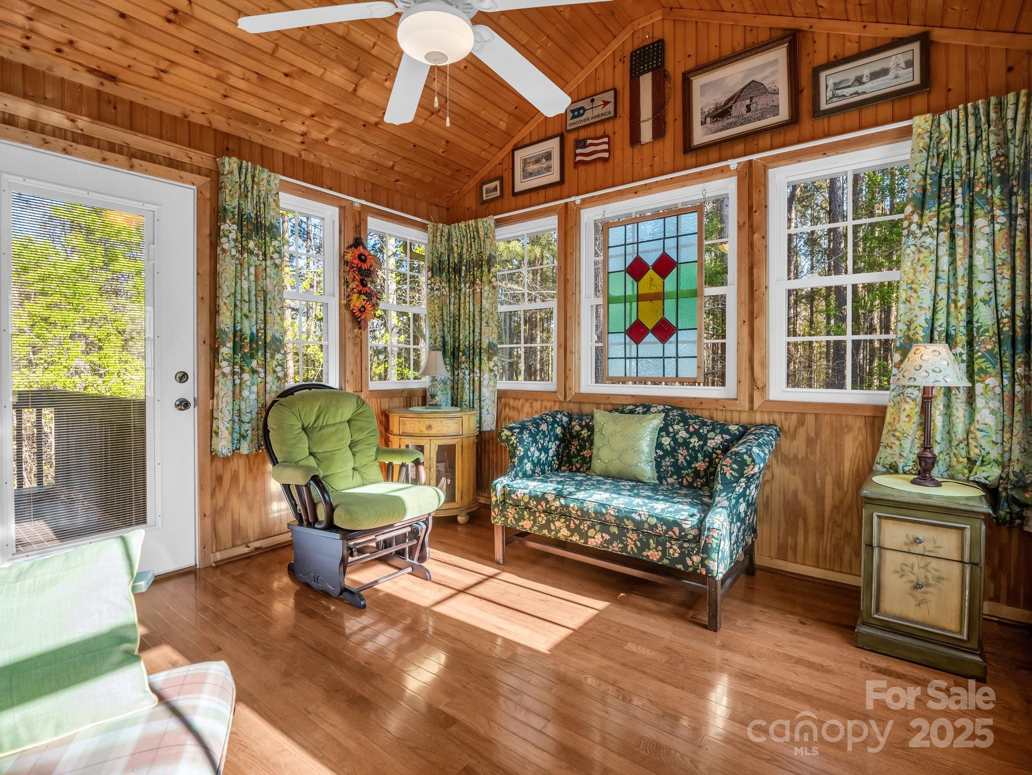 940 Hugh Champion Road Tryon, NC 28782 - Photo 15 of 36 a living room with furniture and a large window