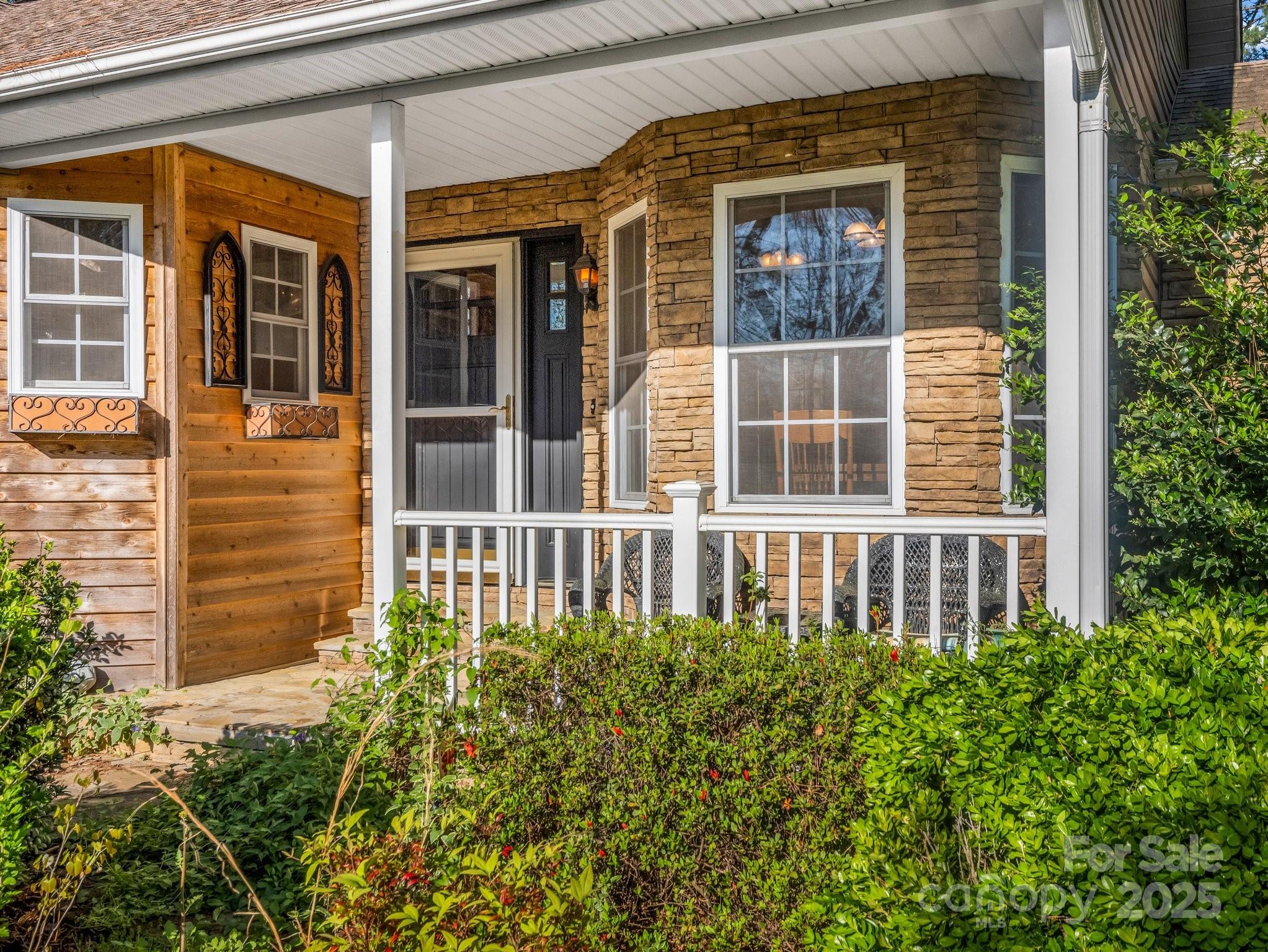 940 Hugh Champion Road Tryon, NC 28782 - Photo 5 of 36 front view of a brick house