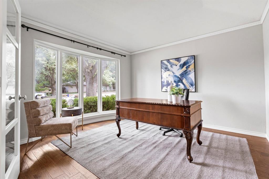 6349 Highgate Lane Dallas, TX 75214 - Photo 21 of 38 a living room with furniture a rug and a large window