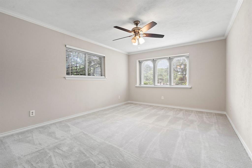 6349 Highgate Lane Dallas, TX 75214 - Photo 33 of 38 a view of an empty room with a window