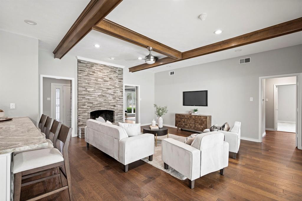 6349 Highgate Lane Dallas, TX 75214 - Photo 4 of 38 a living room with furniture and a fireplace