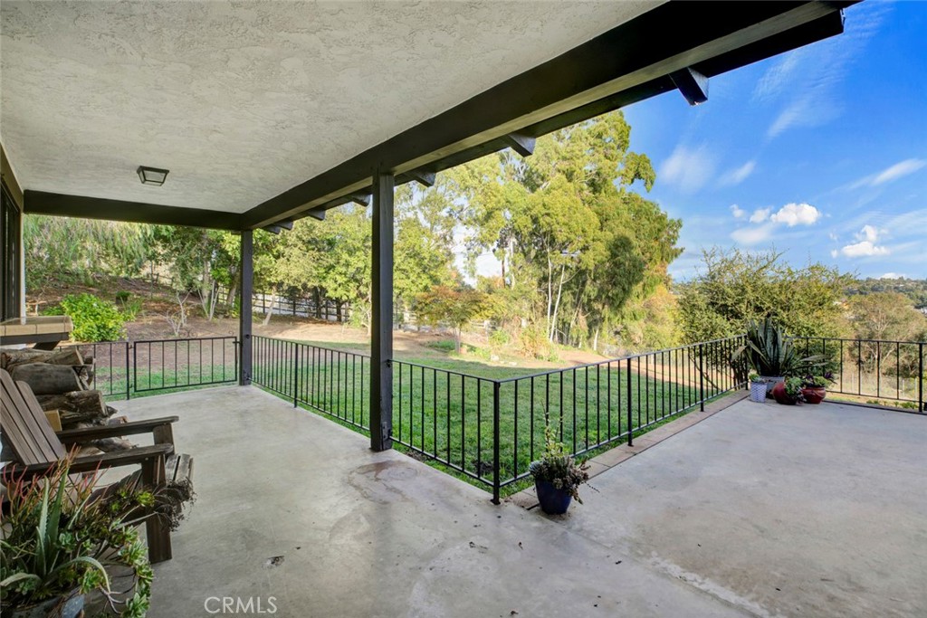 2527 Olive Hill Lane Fallbrook, CA 92028 - Photo 14 of 65 a view of a porch with furniture and a porch