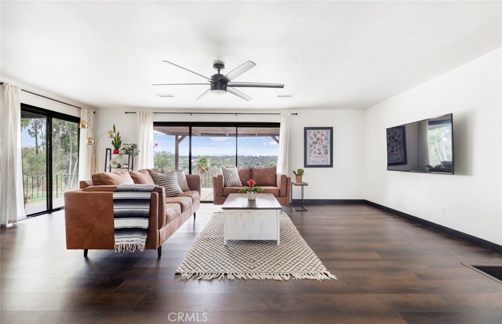 2527 Olive Hill Lane Fallbrook, CA 92028 - Photo 4 of 65 a living room with furniture and a large window