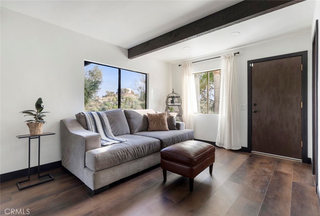 2527 Olive Hill Lane Fallbrook, CA 92028 - Photo 47 of 65 a living room with furniture and a window