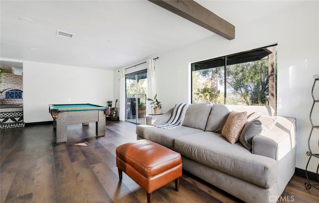 2527 Olive Hill Lane Fallbrook, CA 92028 - Photo 48 of 65 a living room with furniture and a large window