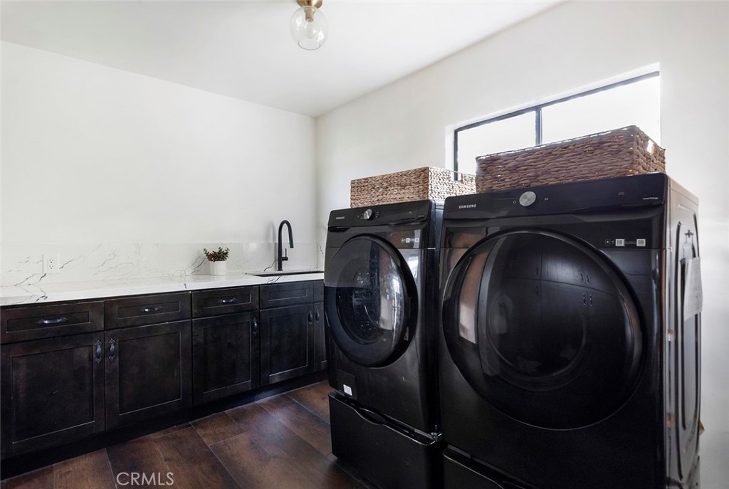 2527 Olive Hill Lane Fallbrook, CA 92028 - Photo 50 of 65 a utility room with dryer and washer