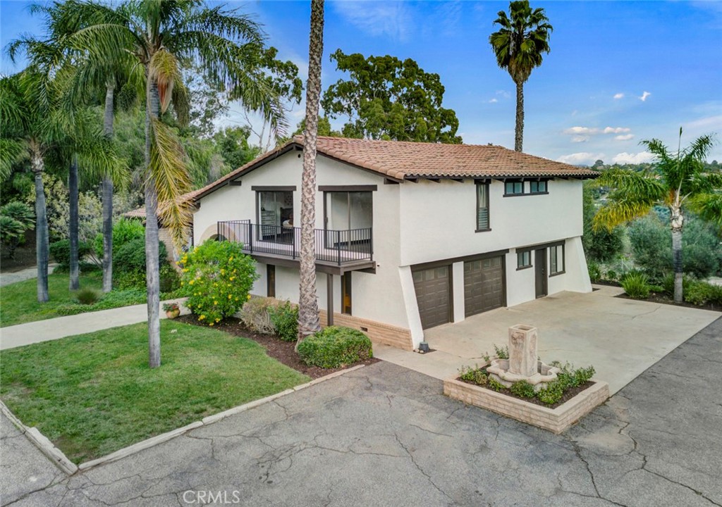 2527 Olive Hill Lane Fallbrook, CA 92028 - Photo 60 of 65 a front view of a house with garden