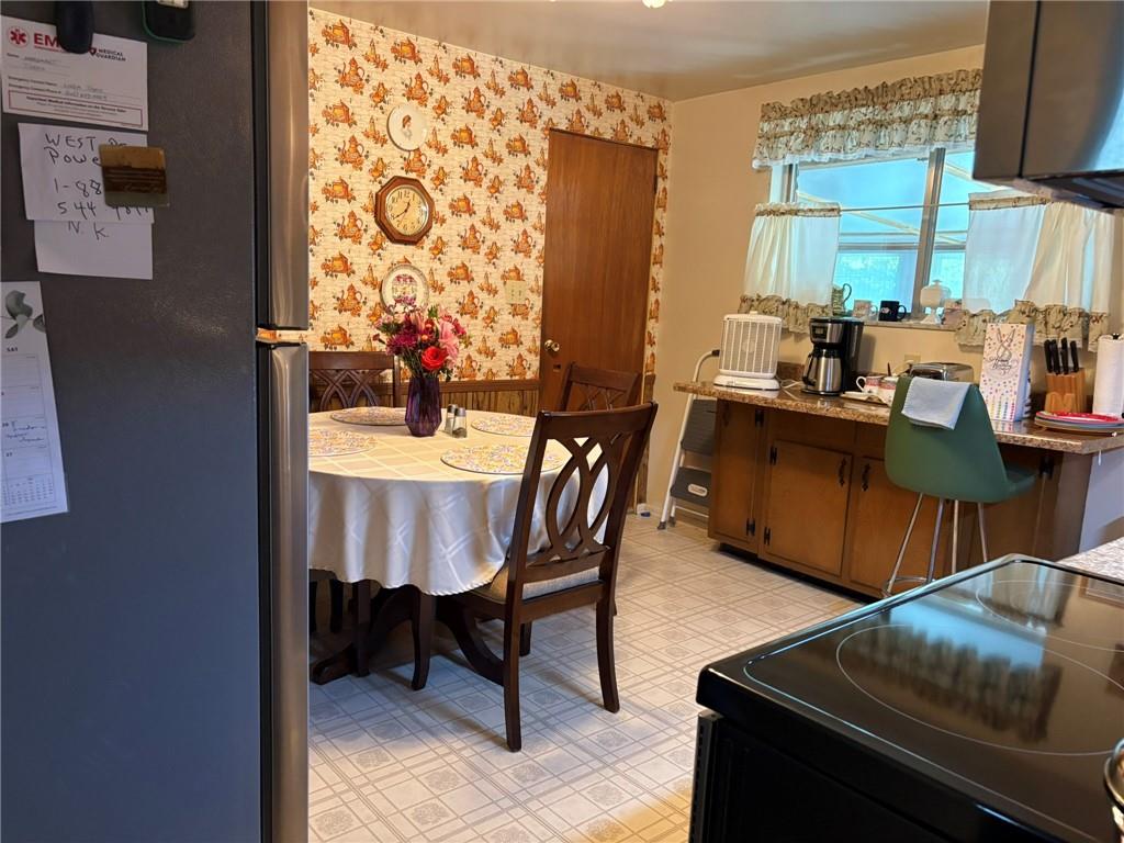 347 Howes Run Road Sarver, PA 16055 - Photo 6 of 16 a view of a dining room with furniture and a window