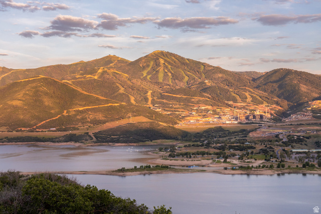 9269 North Sunset Road Kamas, UT 84036 - Photo 10 of 21 Expansive mountain and lake scenery featuring distant ski slopes, a large body of water, and surrounding terrain