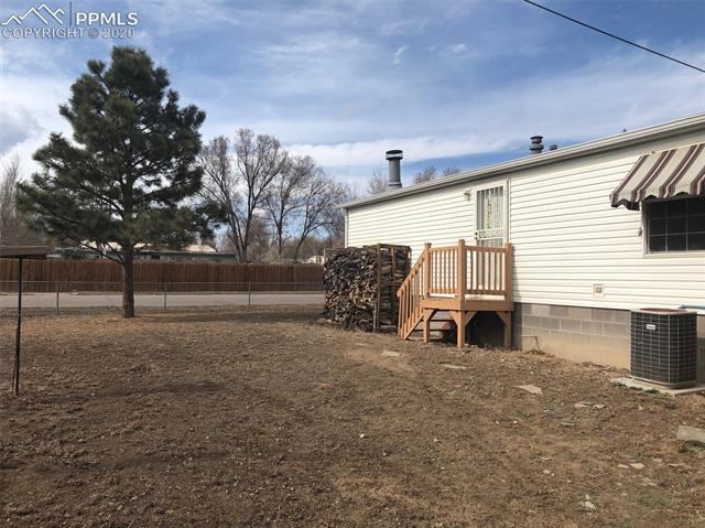 1200 Forest Road Colorado Springs, CO 80906 - Photo 36 of 40 Rear Exterior Of Home