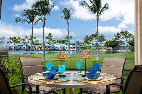 a view of an outdoor sitting area with furniture