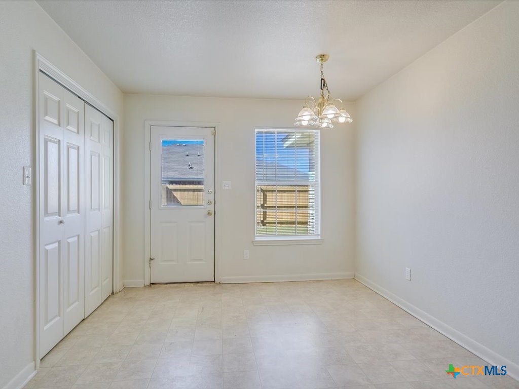 3805 El Paso Drive, Unit A Killeen, TX 76549 - Photo 6 of 20 an empty room with windows and entrance