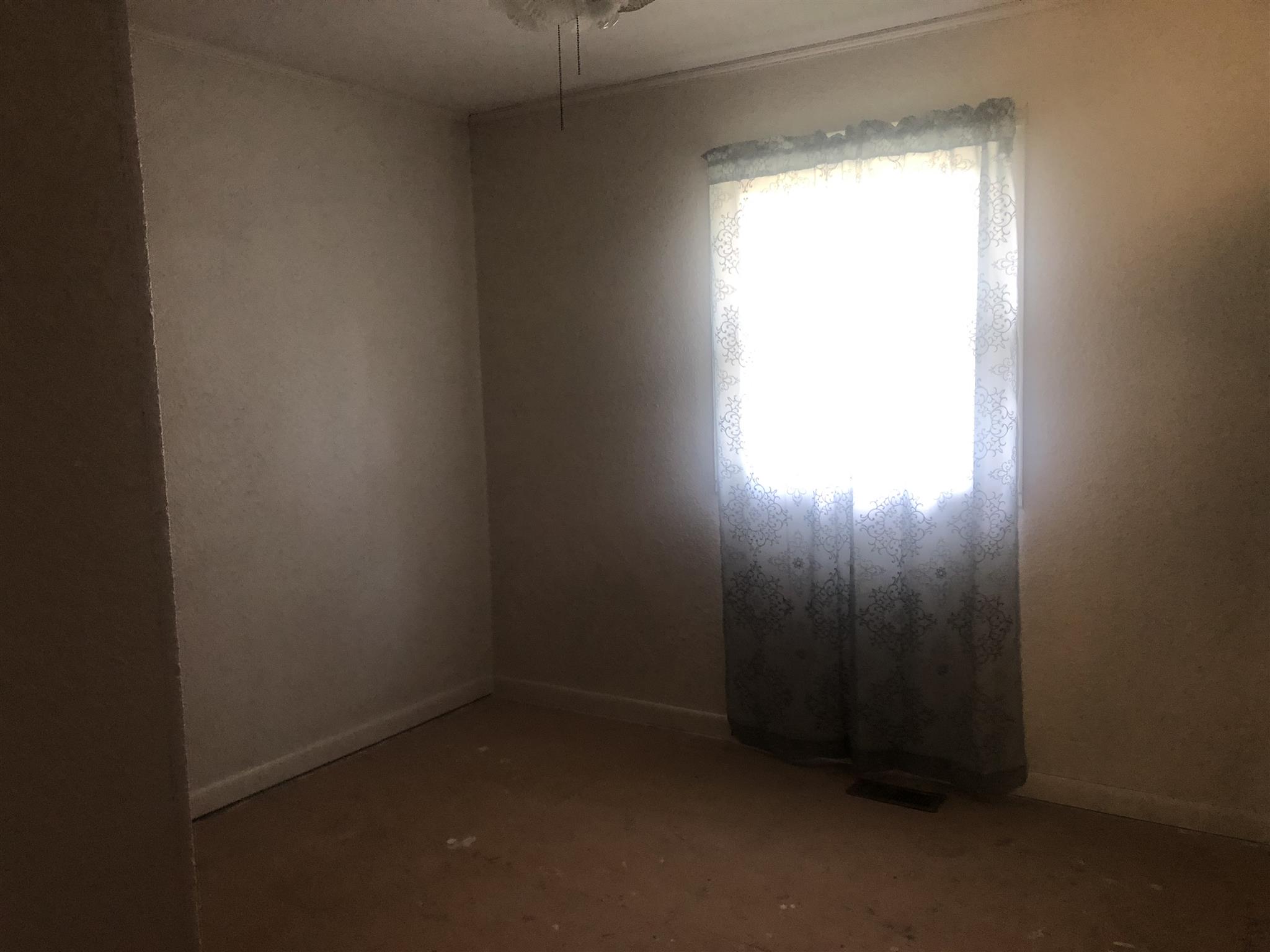 4314 Parkhurst Road Red Boiling Springs, TN 37150 - Photo 5 of 8 an empty room with a window
