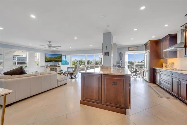 a large living room with stainless steel appliances granite countertop lots of counter top space