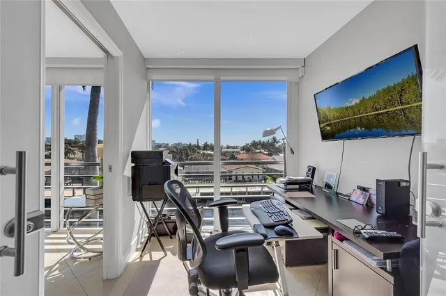 a view of a workspace with furniture