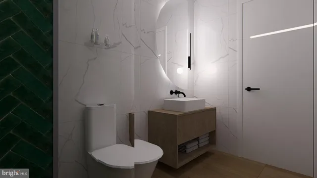 a bathroom with a sink toilet and mirror