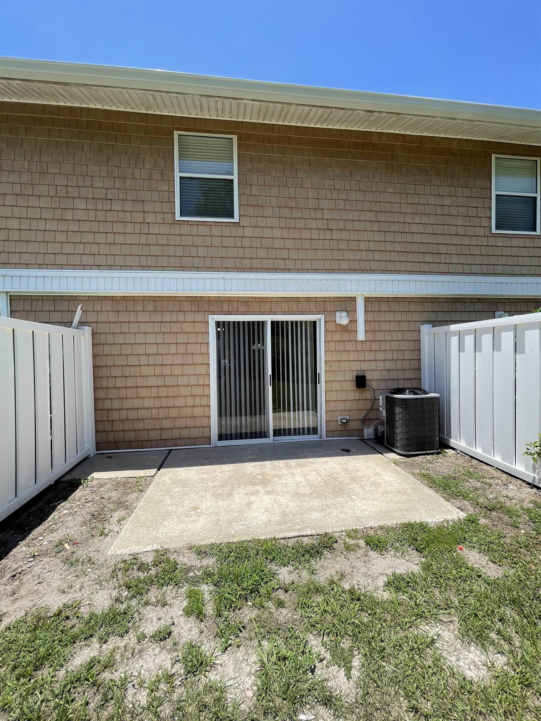 4420 Carter Road, Unit 23 St. Augustine, FL 32086 - Photo 15 of 16 a backyard of a house