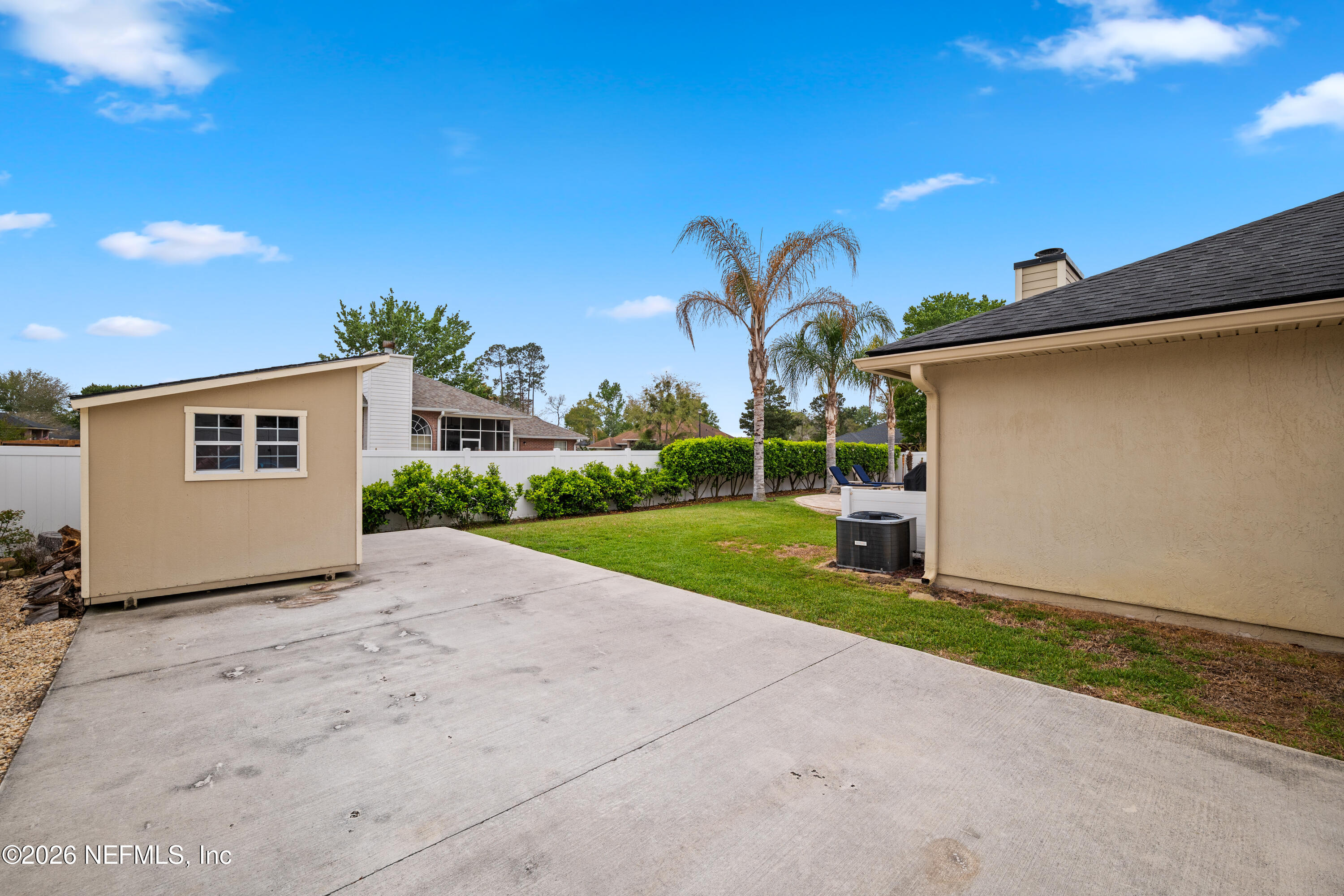 2415 Moon Harbor Way Middleburg, FL 32068 - Photo 52 of 63 51 Extended Driveway and Storage Shed