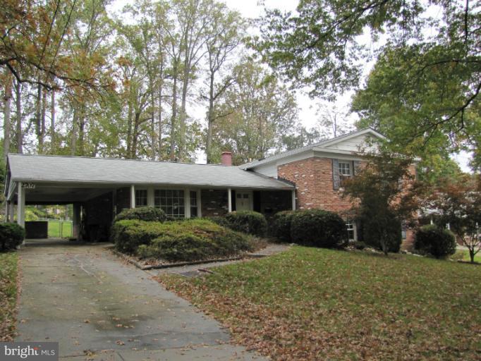 2707 Briggs Road Silver Spring, MD 20906 - Photo 14 of 23 a front view of a house with garden