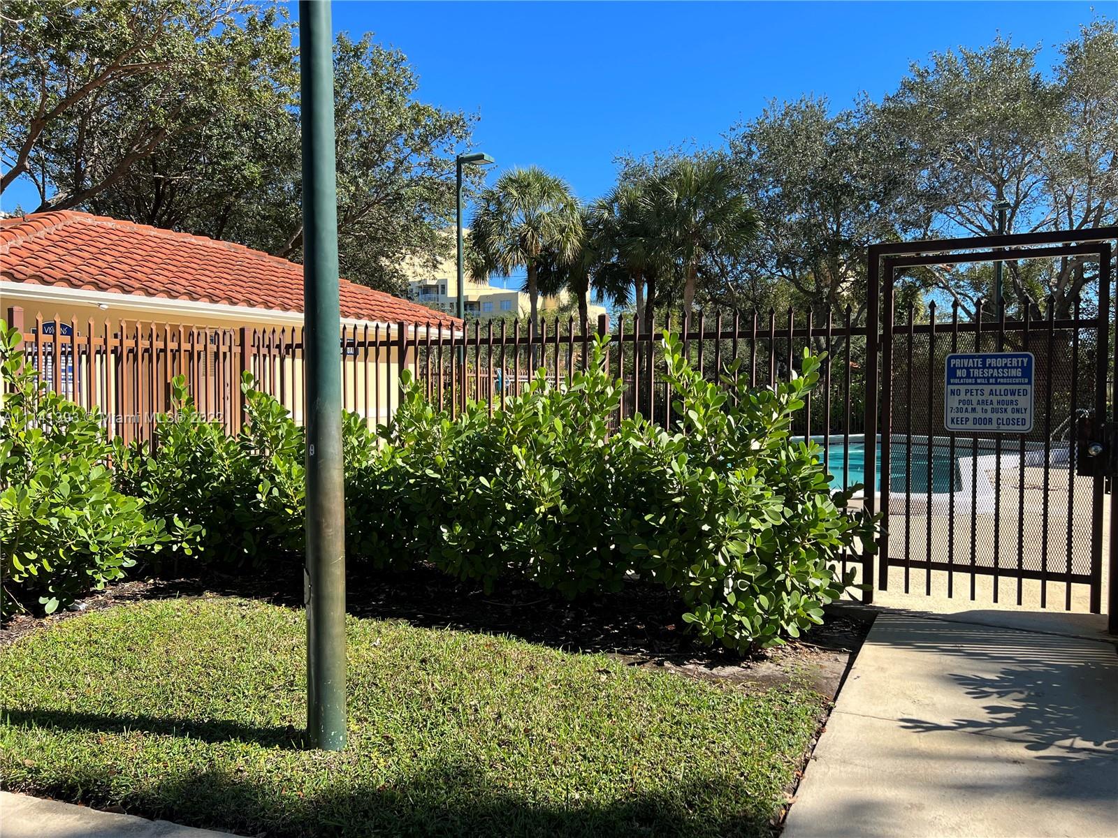 555 Racquet Club Road, Unit 25 Weston, FL 33326 - Photo 11 of 12 a view of a backyard with garden