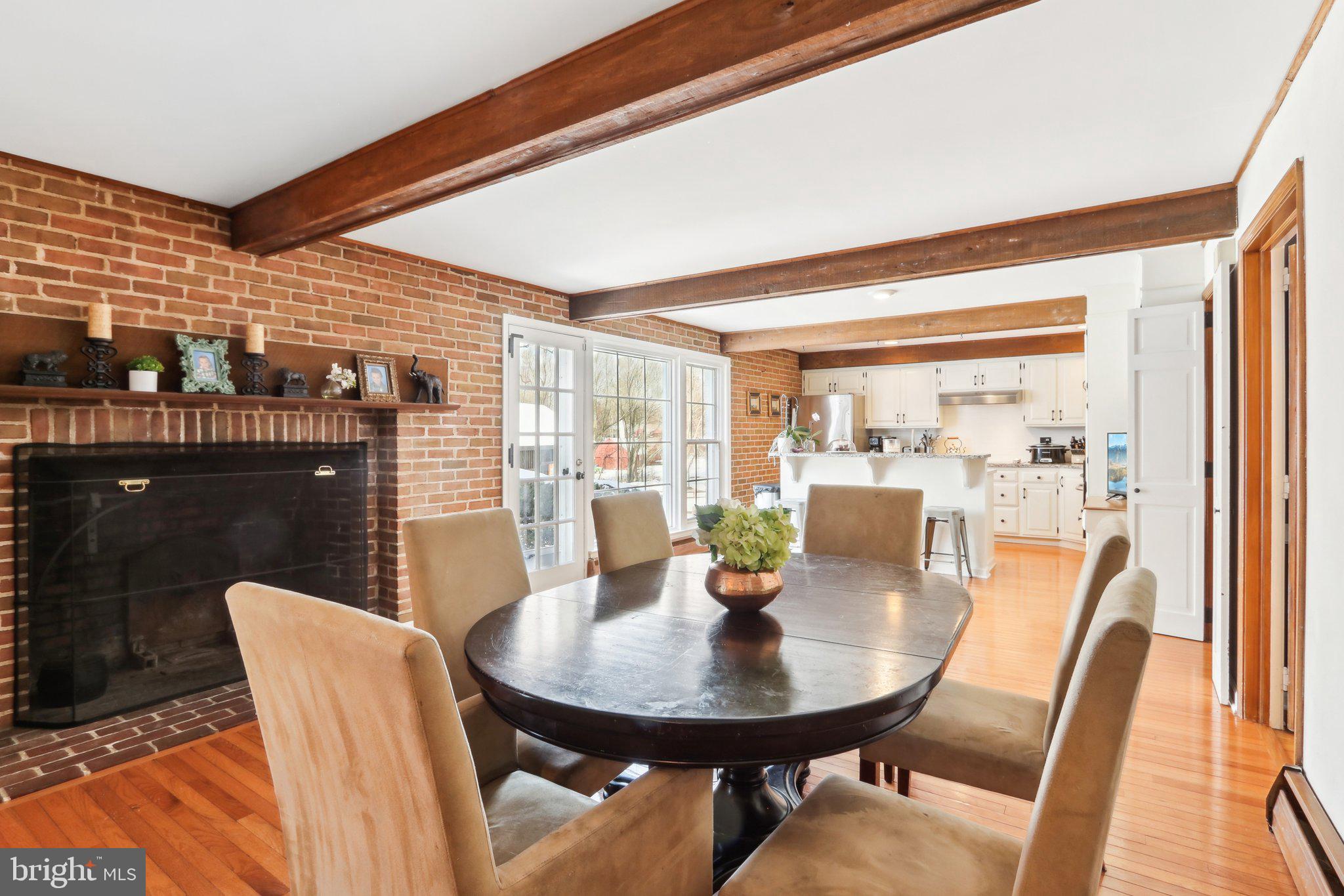 416 Dutton Mill Road Malvern, PA 19355 - Photo 16 of 56 a view of a dining room with furniture and wooden floor