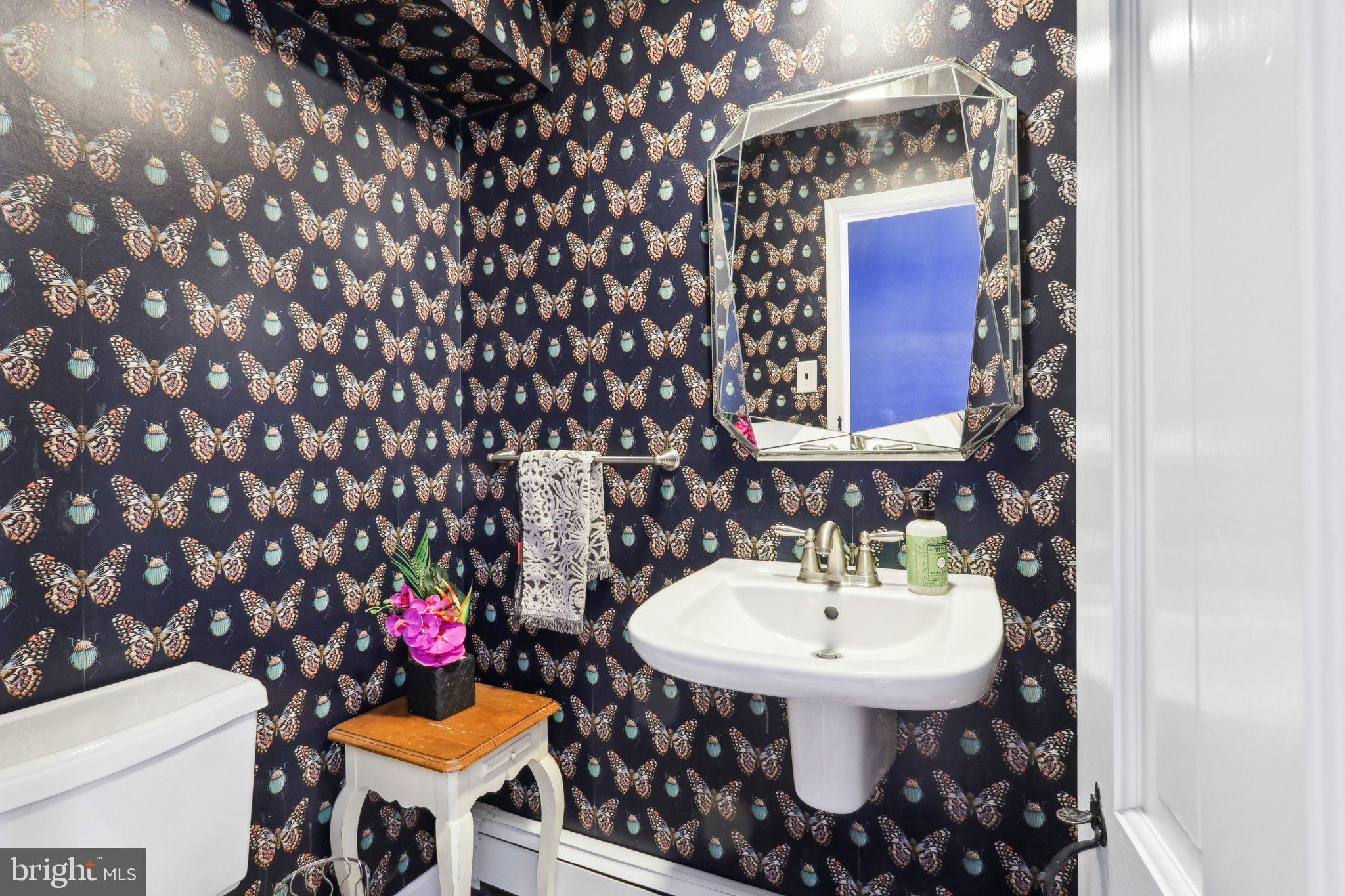 416 Dutton Mill Road Malvern, PA 19355 - Photo 24 of 56 a bathroom with a sink toilet and a mirror