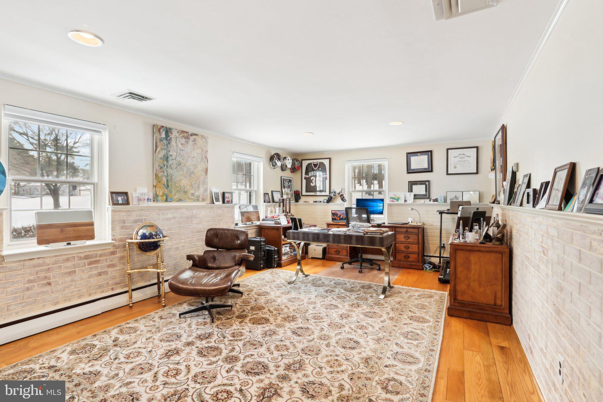 416 Dutton Mill Road Malvern, PA 19355 - Photo 26 of 56 a living room with furniture and a rug