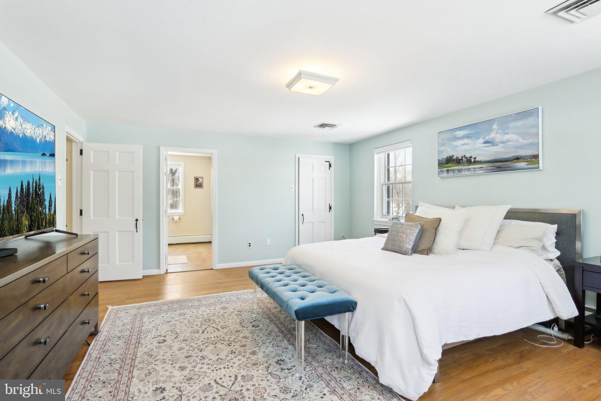 416 Dutton Mill Road Malvern, PA 19355 - Photo 28 of 56 a bedroom with a bed and a dresser