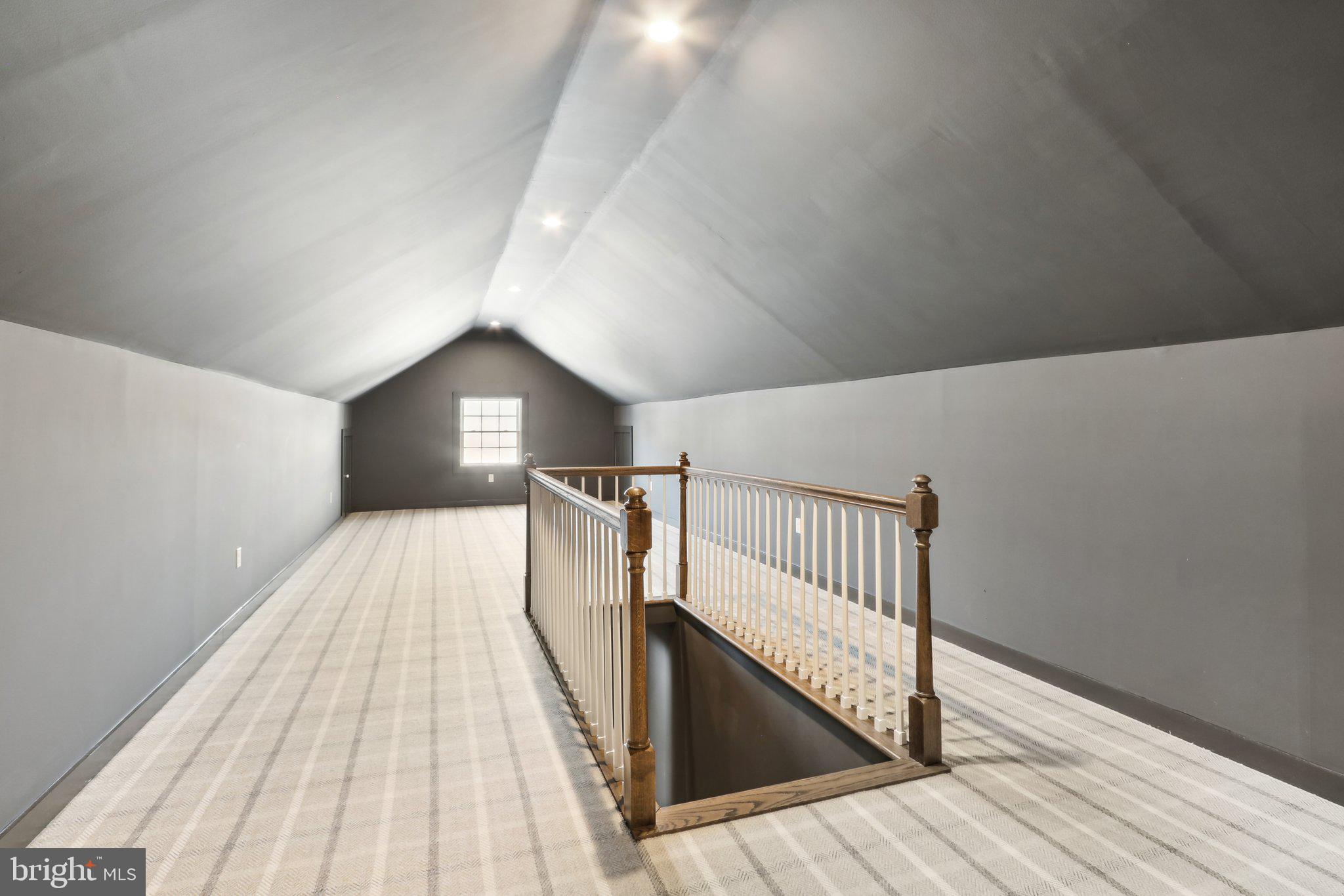 416 Dutton Mill Road Malvern, PA 19355 - Photo 39 of 56 a view of a hallway with wooden floor and staircase