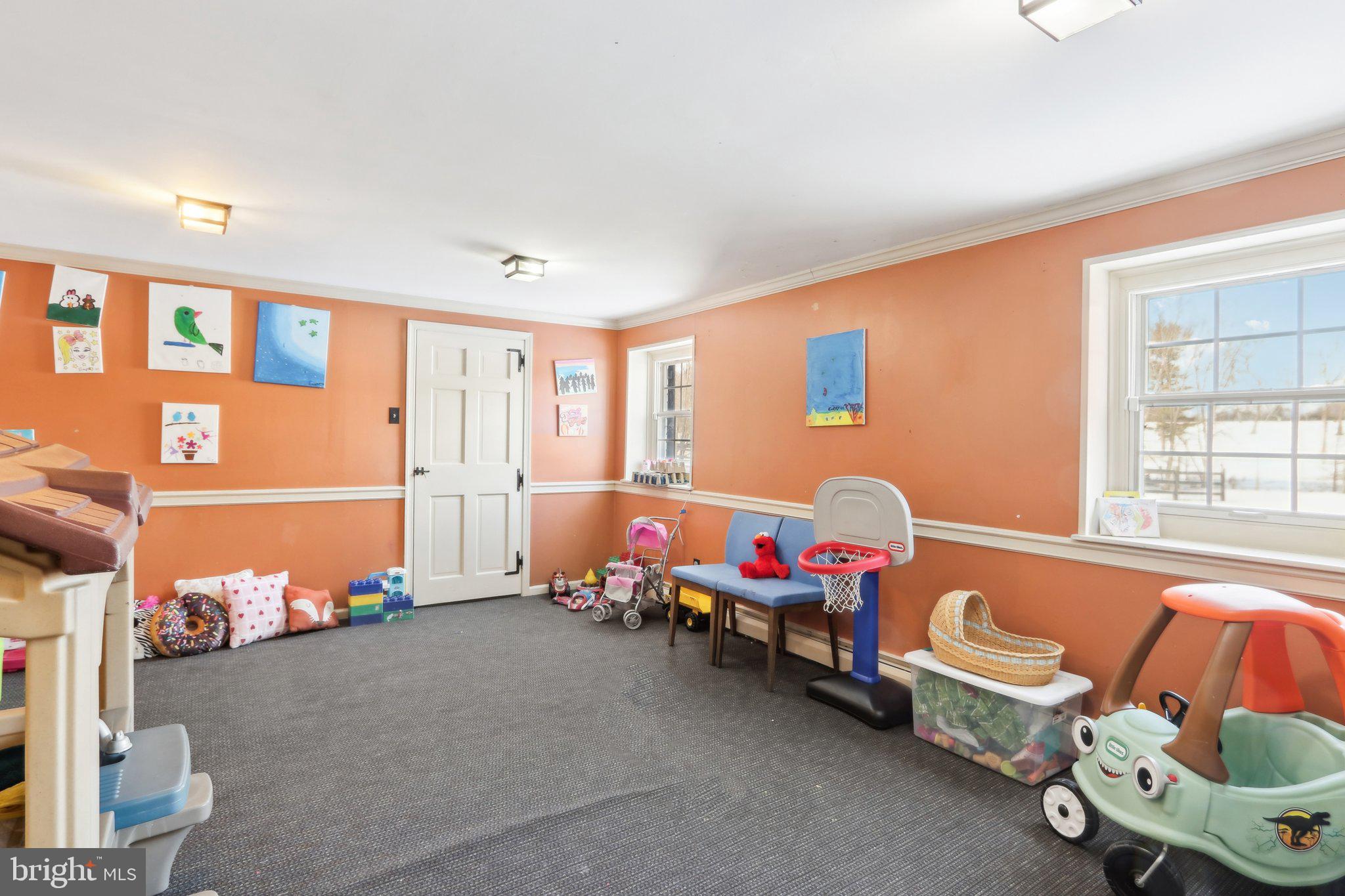 416 Dutton Mill Road Malvern, PA 19355 - Photo 42 of 56 a room with furniture and a window