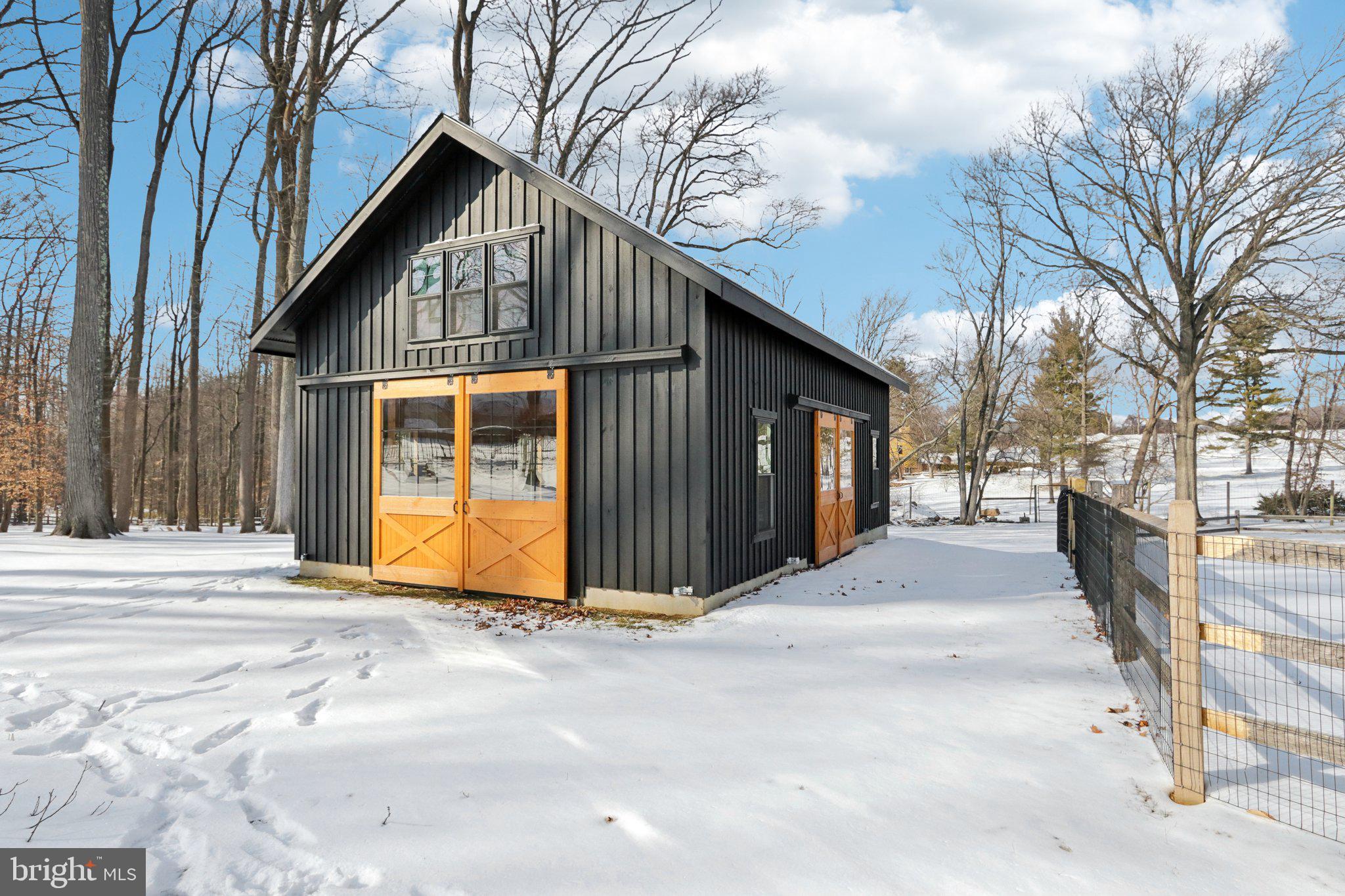 416 Dutton Mill Road Malvern, PA 19355 - Photo 52 of 56 a front view of a house with a yard