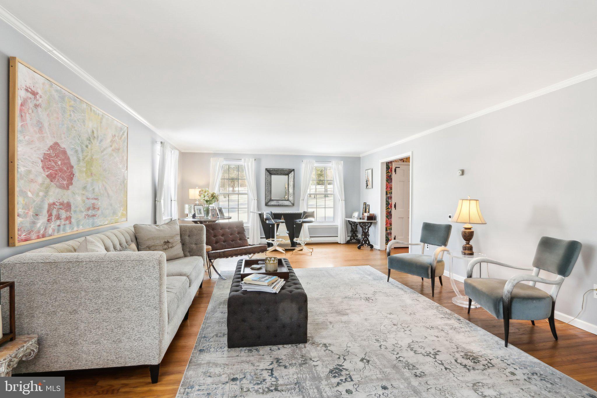 416 Dutton Mill Road Malvern, PA 19355 - Photo 7 of 56 a living room with furniture and a couch