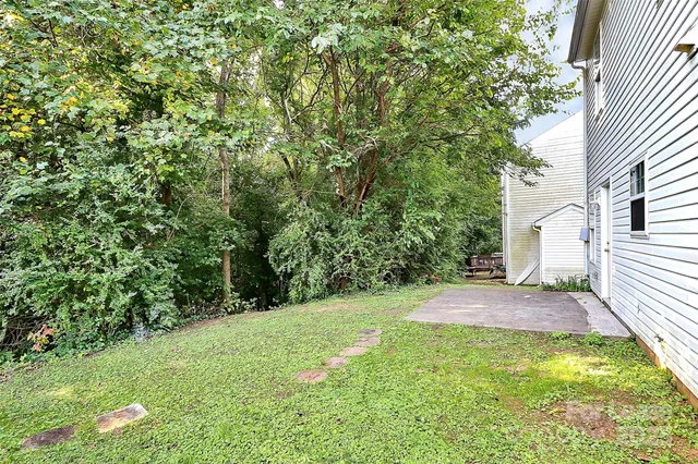 a view of a backyard with a garden