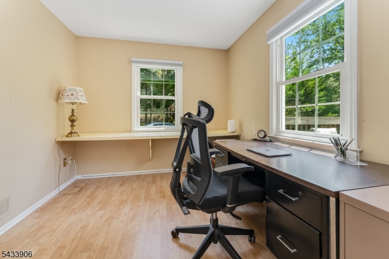 14 Lexington Road Annandale, NJ 08801 - Photo 20 of 47 a view of a room with gym equipment on wooden floor