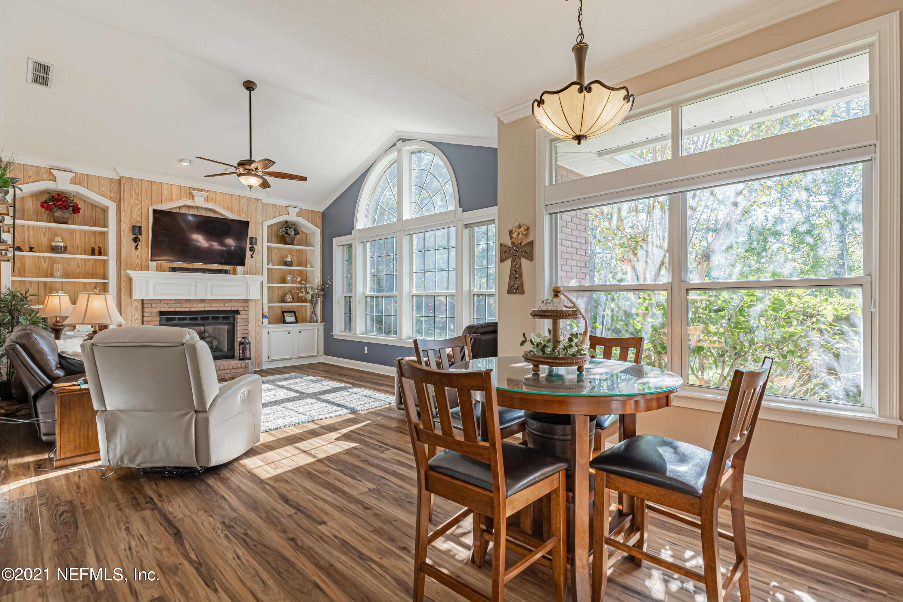 1827 Wild Grape Lane Fleming Island, FL 32003 - Photo 15 of 51 a view of a dining room with furniture window and wooden floor