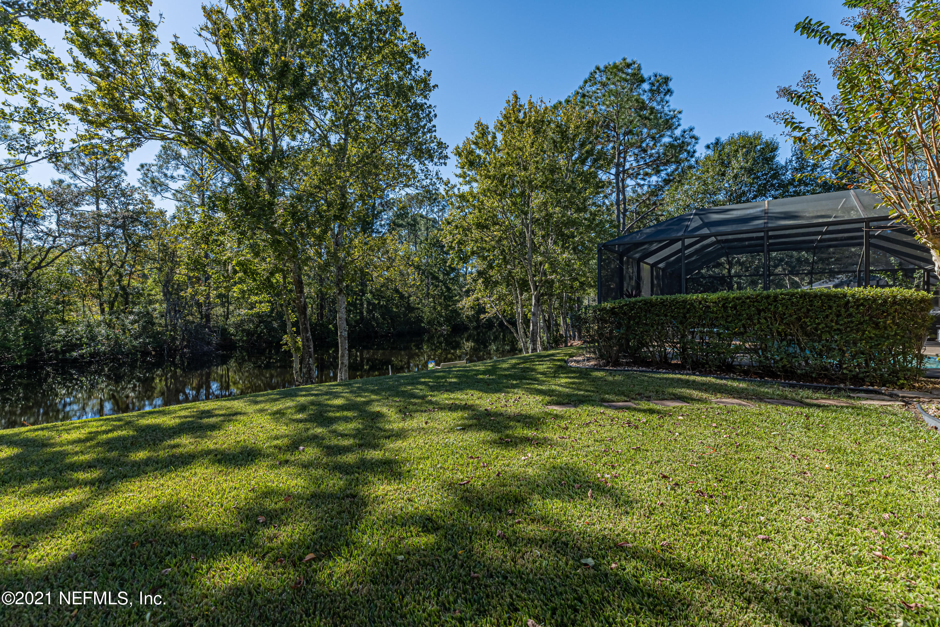 1827 Wild Grape Lane Fleming Island, FL 32003 - Photo 39 of 51 a backyard of a house with lots of green space